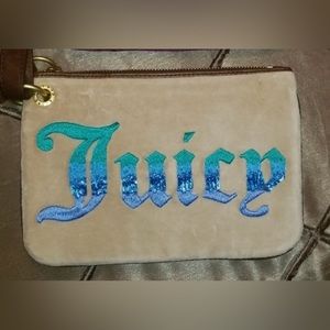 Authentic Y2K Juicy Couture Wristlet, (NWOT) mint condition/pet free/smoke free.